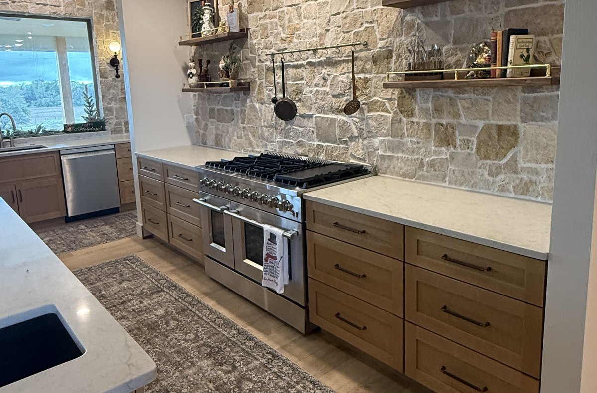 EZ Click kitchen cabinets — a full run of base cabinets and drawers flanking a range