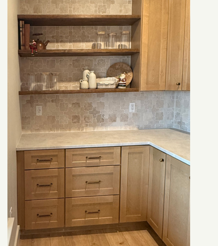 Solid wood floating shelves on a kitchen wall